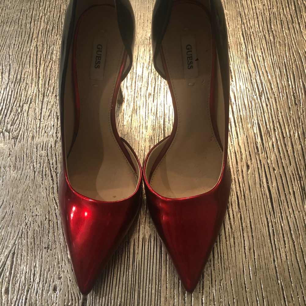 Red and black guess shiny heels. Only wore once!